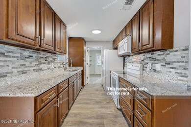 8990 Hermance Ct, Jacksonville, FL 32216 - photo 4