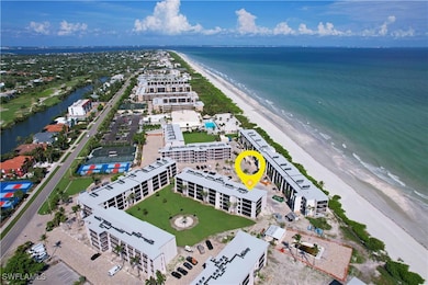 Drone / aerial view with a view of the beach and a