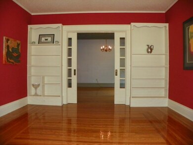 Living Room. A wall of built-ins looking from the 