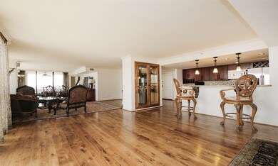 Another view of the kitchen and living room with g