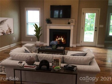 Virtual staging of greatroom.