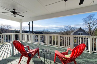 Inviting Covered Front Porch with Mountain Views.