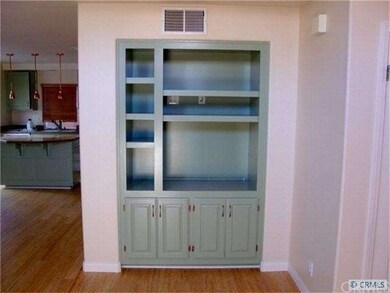 Built-in book shelves or media area