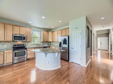 581 N Flat Rock Cir, Aurora, CO 80018 - photo 2