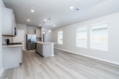 Open dining area to the living room and kitchen