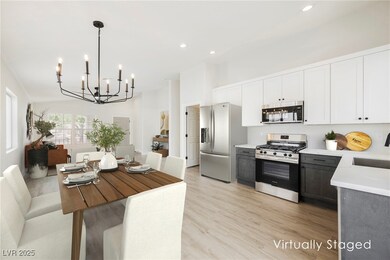 Kitchen featuring stainless steel appliances, ligh