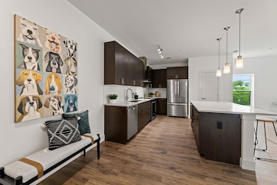 Kitchen with a sink, stainless steel appliances, 