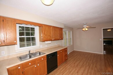 Kitchen has Plenty of Cabinets plus Pantry and Acc