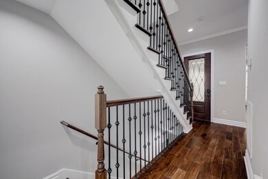 Stairs leading to the first and third floor.