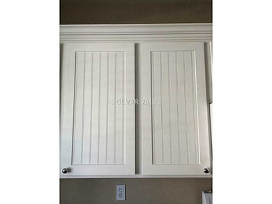 Property Photo. Upgraded kitchen cabinets