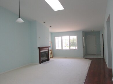Foyer, living room, dining area