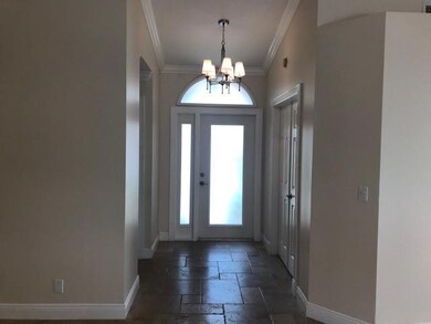 Double doors on right lead to third bedroom with l