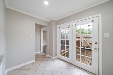 Breakfast nook.  French doors lead to private pati