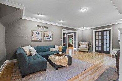 Open floor plan with gorgeous hardwood floors. 