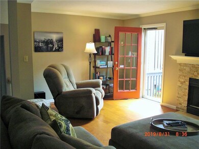 Door leading out to the rear deck from the living 