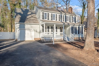 Traditional inspired home with covered porch and a