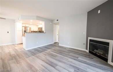 Open floor plan with kitchen, dining, and family r