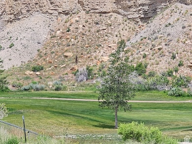 View of property's community featuring a lawn