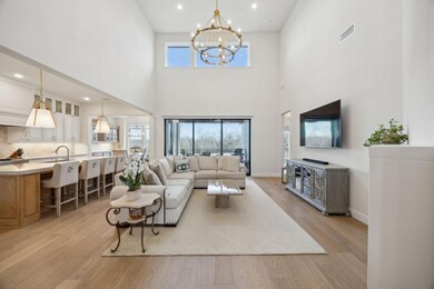 Living area with light wood-type flooring, visible