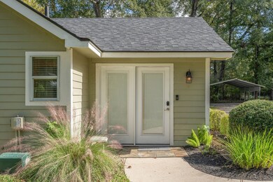 Welcoming front entry with well-kept greenery setting the tone for the home.