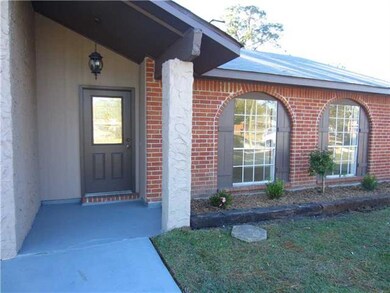 Photo. Very Welcoming.....Beautifully Landscaped