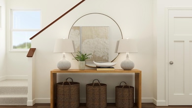 Accessibly located near the main entrance, this elegant staircase leads to the upper level four bedrooms, two bathrooms, and the laundry room. Virtual rendering of NEW Marquette plan in production at Cedar Hills!