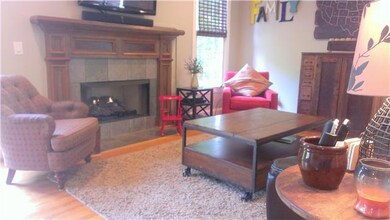 A cozy fireplace centers the living room, Just flip a switch and it ignites.  This informal space was meant to be used and enjoyed by the whole family everyday.  