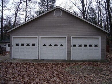 7688 N Woodbridge Rd, White Cloud, MI 49349 - photo 3