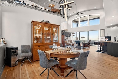 Dining area with wood flooring
