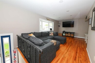 Living room with light wood-style floors