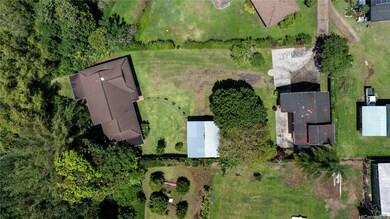 Aerial view of lot and structures.