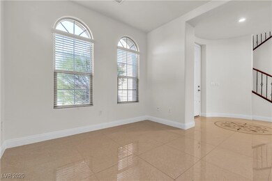 Spare room with light tile patterned floors and recessed lighting