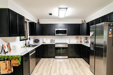 303 N Hudson Ave, Aurora, MO 65605 - photo 5