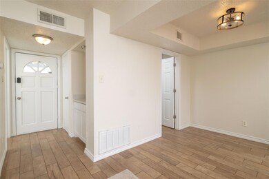 looking towards front door and dining room. Laundr
