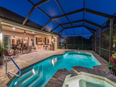 Enjoy spacious pool deck, covered dining area and 