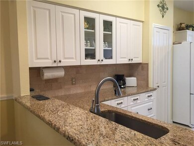 Close up view of the granite, sink and faucets and