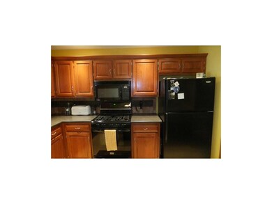 Kitchen w/tiled backsplash & updated cabinetry