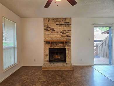 Unfurnished living room with baseboards, a ceilin