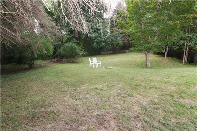 The property is a generous 0.5 acre on an END LOT 
