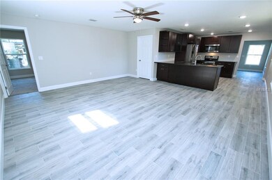 Family room looking into kitchen