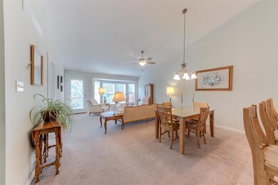 Vaulted great room, dining area & kitchen