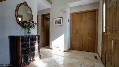 Front entry foyer with formal half bath.