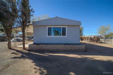 View of home's exterior with a carport