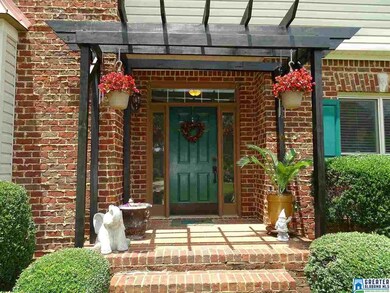 Inviting entry with arbor.