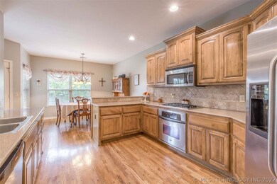 Stainless appliances, tons of cabinets and counter