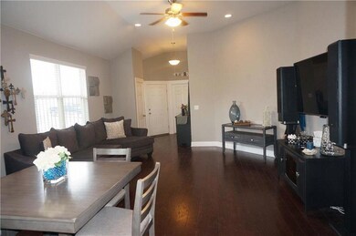 Dining room with ceiling fan, lofted ceiling, dar