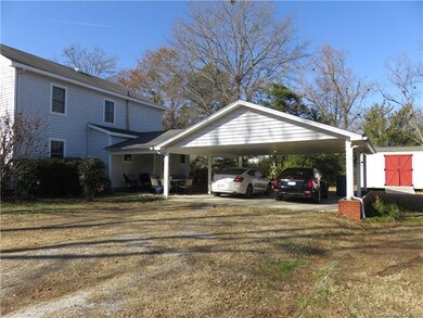 Back of home with tons of parking and a new large 
