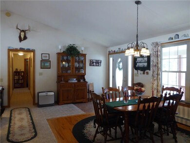 Front entrance from porch into...