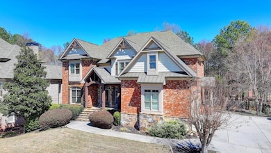 View of front of property with metal roof, stone s