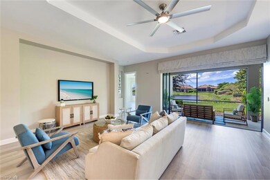 Living room featuring light wood-type flooring, a 